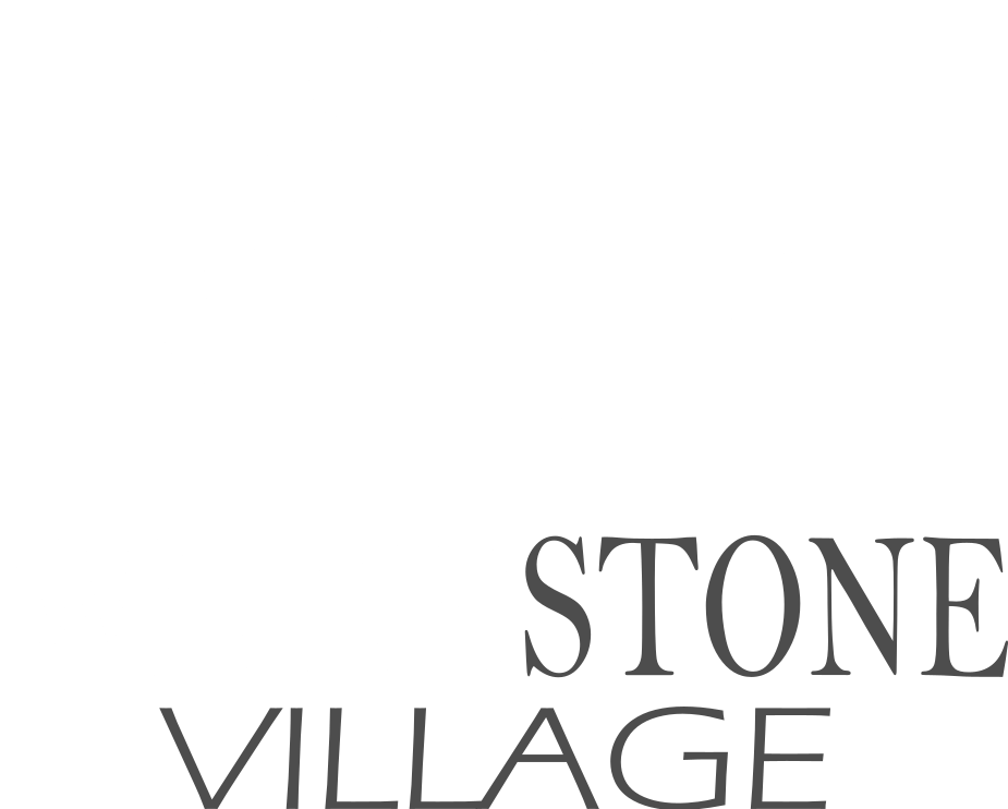 A black and white image of a stack of stones with the words "Whitestone Village" written below it.